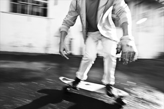 Skateboarder riding a longboard