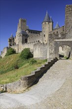 Towers and entrance gate Port d'Aude of the medieval fortress of Carcassonne
