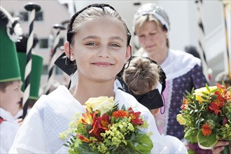 Fishing girl during a parade