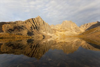 Reflection of Mount Monolith in calm Grizzly Lake