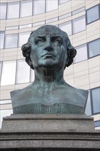 Bust of Friedrich Wilhelm von Schadow in front of the Libeskind building in the Ko-Bogen shopping centre
