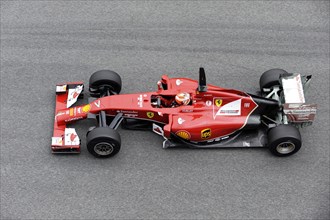Kimi Raikkonen in the Ferrari F14 T