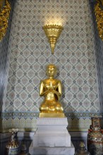 Buddha statue in the Temple of the Golden Buddha or Wat Traimit