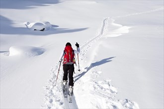 Ski walkers ascending to the Juribrutto at Passo Valles