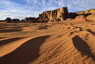 Rock towers and sand dunes at Tamezguida