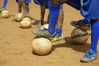 Feet of Brazilian children with balls