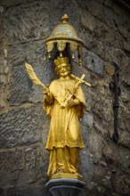 Statue of Saint Nepomuk at the corner of a house