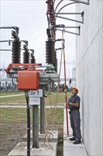 Special engineer during outdoor work at a substation of transmission network operator 50Hertz