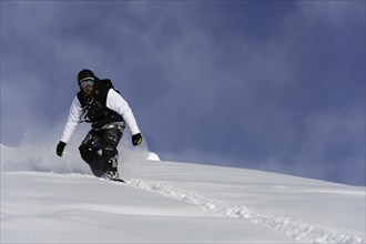 Freerider on a snowboard