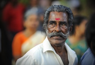 Elderly man with a bindi