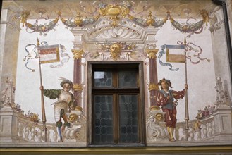 Renaissance style frescoes on the wall of the courtyard at Peles Castle