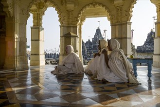 Jain nuns praying in a temple