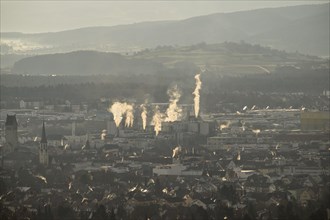 Cityscape with smoky chimneys