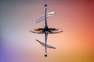 Three drops collide