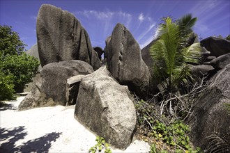 Typical rock formations in the Seychelles at a sandy beach