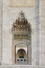 Main entrance with muqarnas decorations