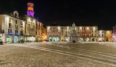 Piazza Cavour with the illuminated Torre the Angel or Angel Tower