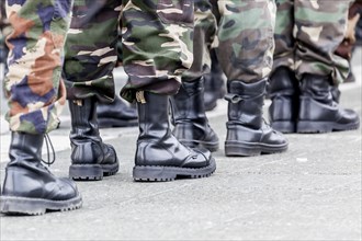 Members of a right-wing Hungarian party wearing combat boots