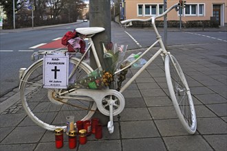 White bicycle with candles