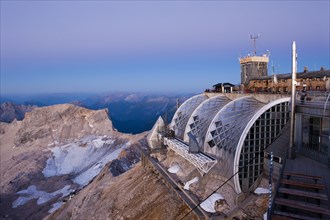 Summit plateau of Mt Zugspitze with a terrace and Munchner Haus mountain hut