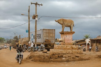 Street scene at the damaged elephant monument in the town of Yokadouma