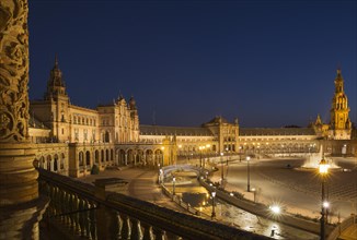 The illuminated Plaza de Espana at dusk