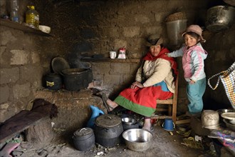 Mother and daughter in a traditional kitchen