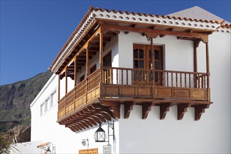 House with traditional wooden balcony