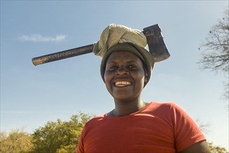 Woman wearing ax on her head