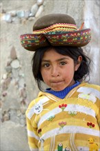 Girl with traditional hat