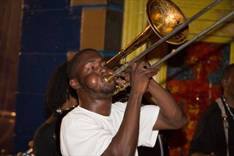 Street musician playing trombone