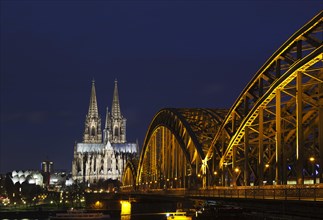 Hohenzollern Bridge with Cologne Cathedral at dusk