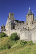 Towers and entrance gate Port d'Aude of the medieval fortress of Carcassonne