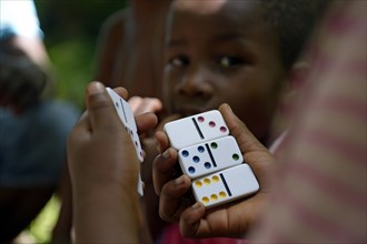 Children playing dominoes