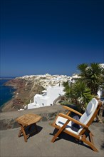 Deck chair on the terrace with sea view