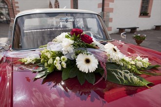 Floral decoration on a wedding car