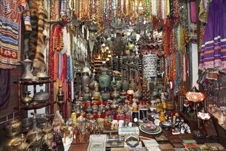 Colourful wares and souvenirs in a shop in the Muttrah Souq market