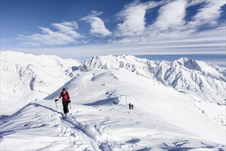 Ski hiker on the summit ridge of the Stotz at Kurzras in the Schnalstal