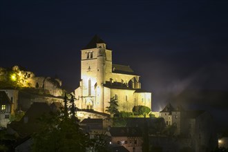 Fortified church at night