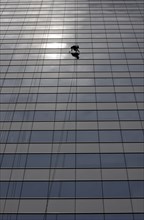 Window cleaner cleaning a window pane