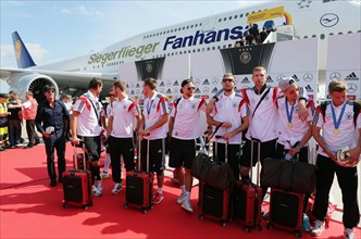 Arrival of the German national team after their victory at the FIFA World Cup 2014 at Tegel