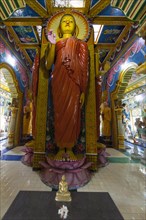 Statue in the old Buddhist temple complex of Sri Pushparama Maha Viharaya