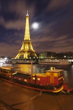 Boats on the Seine and Eiffel Tower