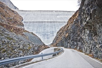 Road at the largest concrete dam in Switzerland