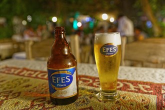 Efes Pilsen beer bottle and beer glass