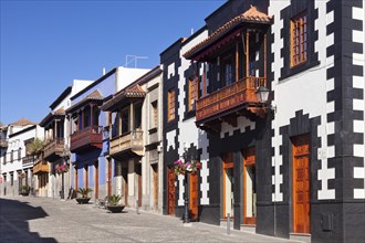 Houses with traditional wooden balconies