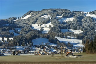 Village of Le Paquier in the wintery Fribourg Pre-Alps