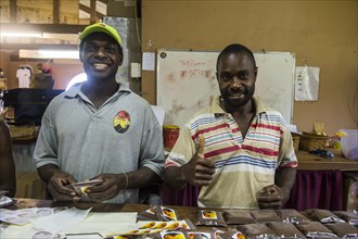 Local men packing fresh coffee in Tanna coffee factory