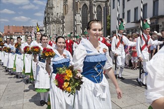 Fair maidens during a parade on Munsterplatz square