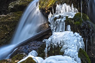 Myra Falls with ice in winter in Muggendorf
